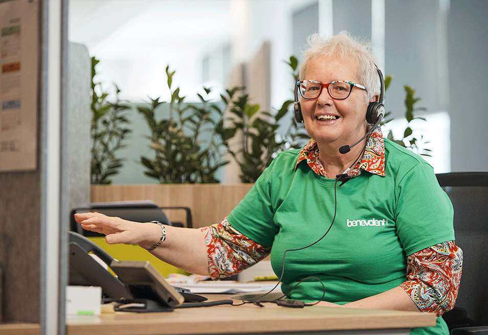 A smiling photo of Branka from our Support Centre. She is wearing a green shirt.