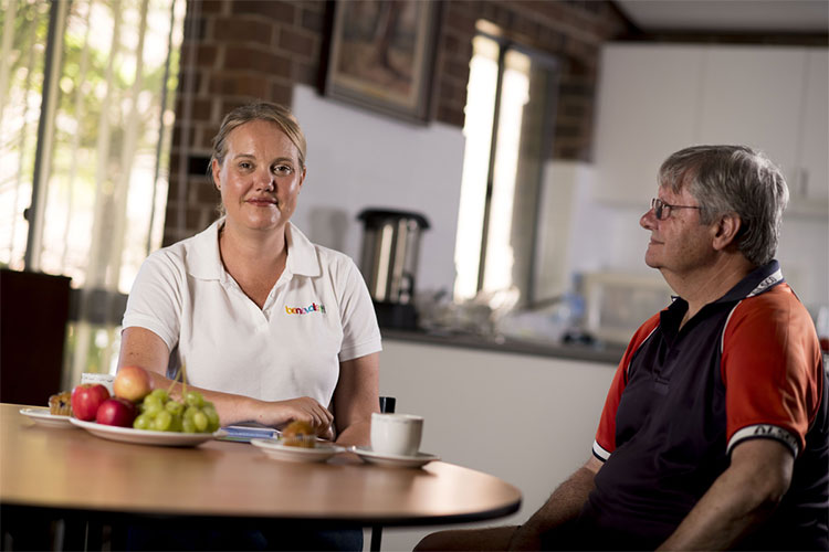 Chela at home with an aged care client.